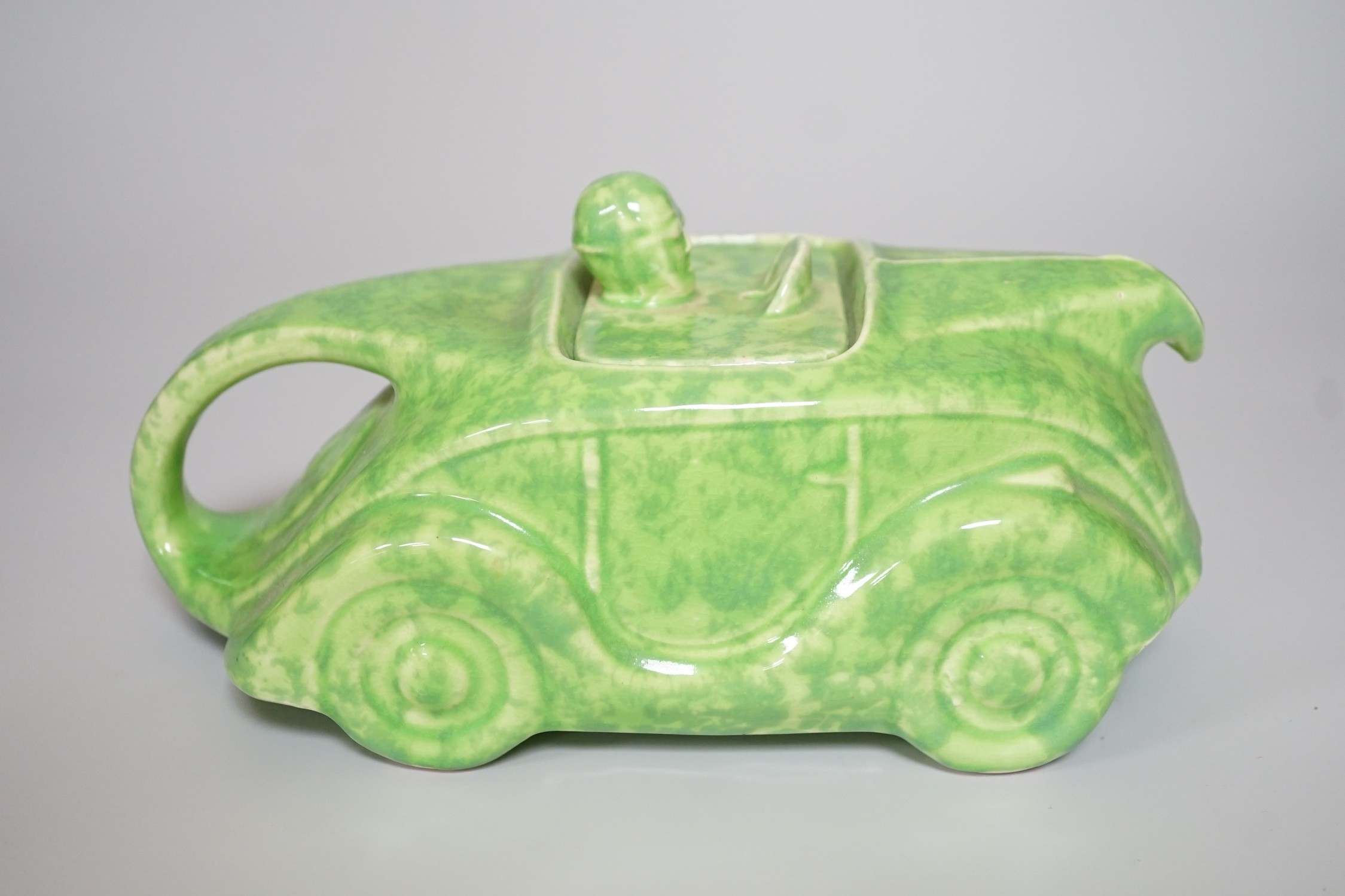 A Sadler's green-glazed novelty racing car teapot, 22cm
